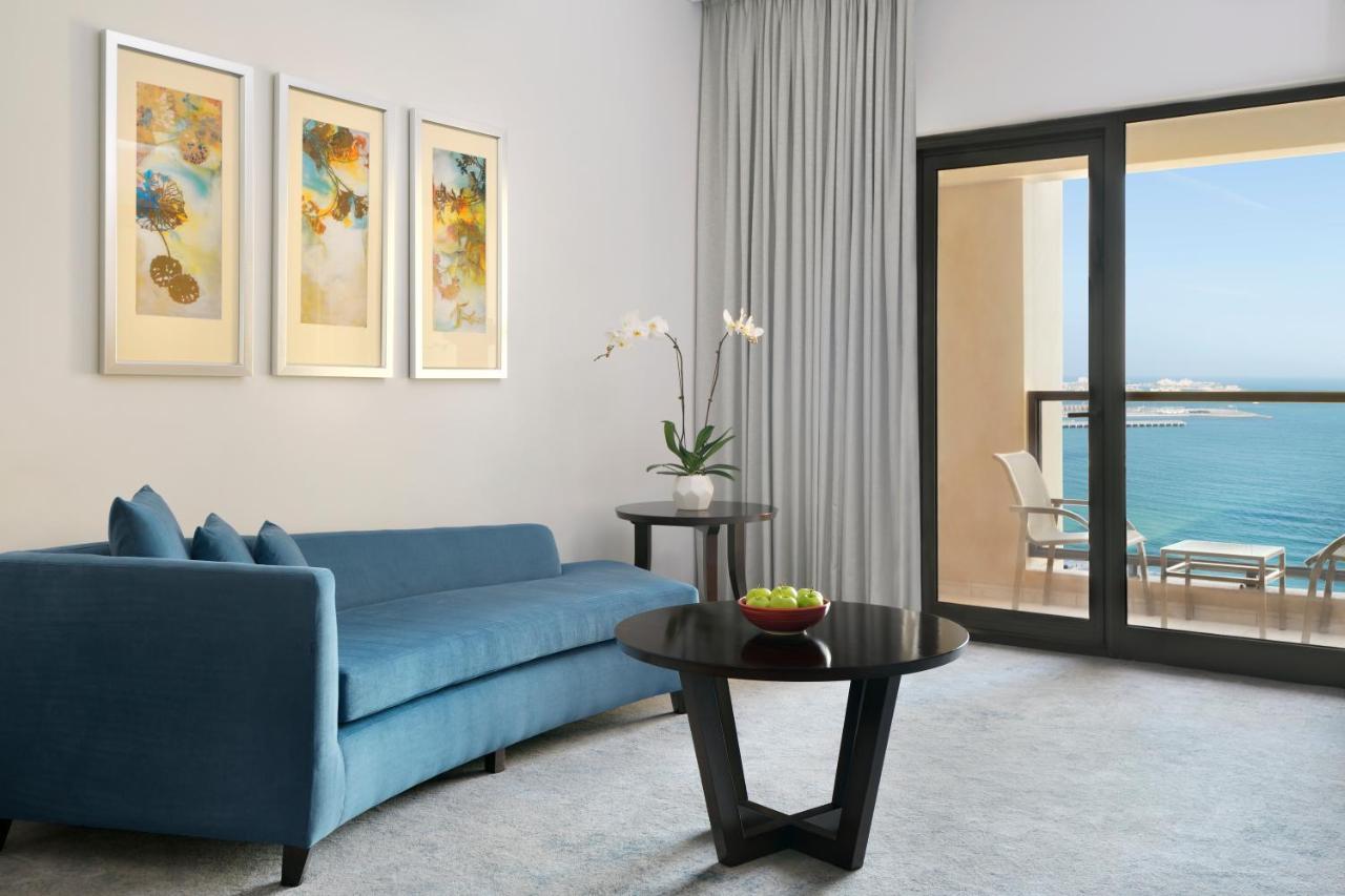 뫼벤픽 호텔 주메이라 비치 두바이 외부 사진 A living room at the Atlantis Paradise Island